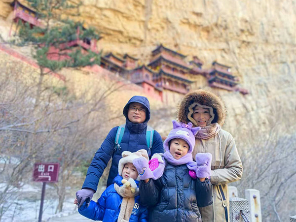 Songlin, his wife, and children at the Hanging Temple in Datong, China